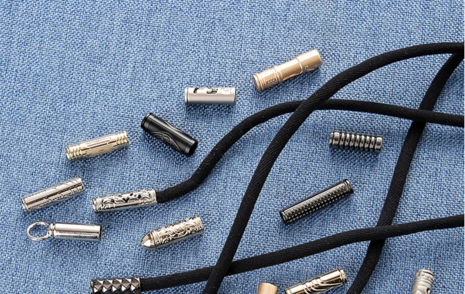 服装辅料20mm合金子弹头单孔吊钟帽绳金属绳扣绳头绳带配件