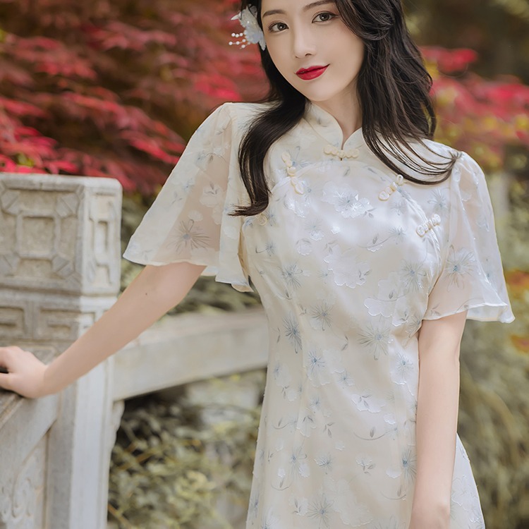 白竹飘逸灵动古风连衣裙2021夏季新款女装立领荷叶袖花色中长裙女