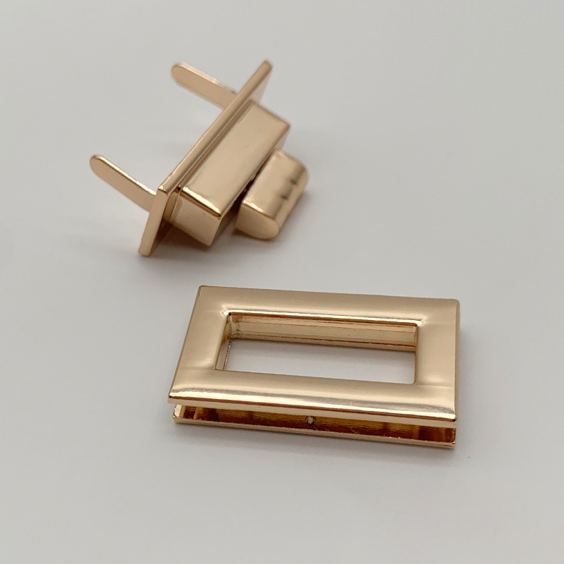 厂家供应箱包装饰锁扣旋转开关拧锌合金锁扣手袋五金装饰配件