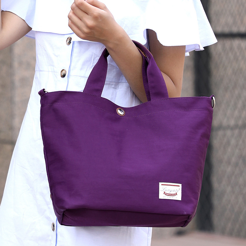 女士手提牛津布包新款尼龙女包斜跨包单肩包帆布包大容量单色包女