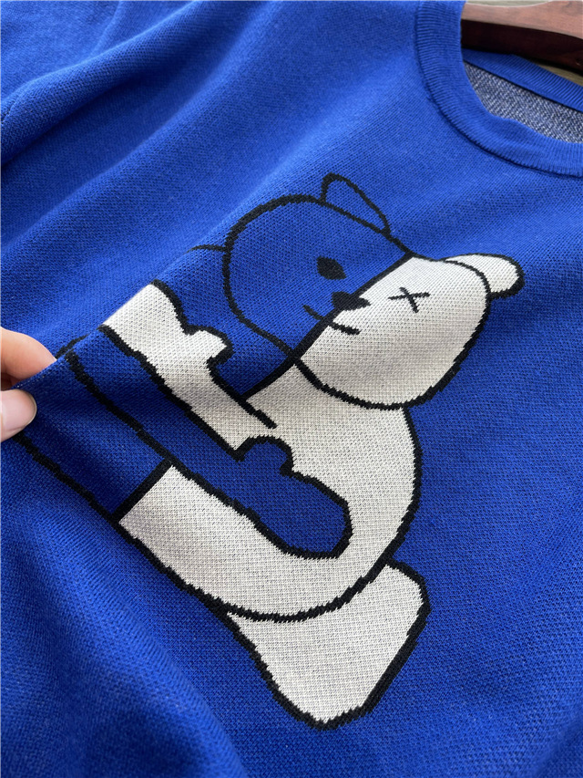 时髦显白蓝色双面撞色提花抱抱熊羊毛圆领套头针织毛衣女宽松加厚