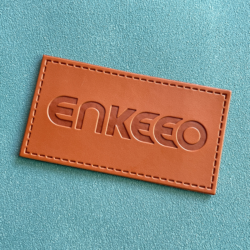 超纤压花logo真皮皮标 pu仿皮商标皮牌 服装箱包商标厂家直销