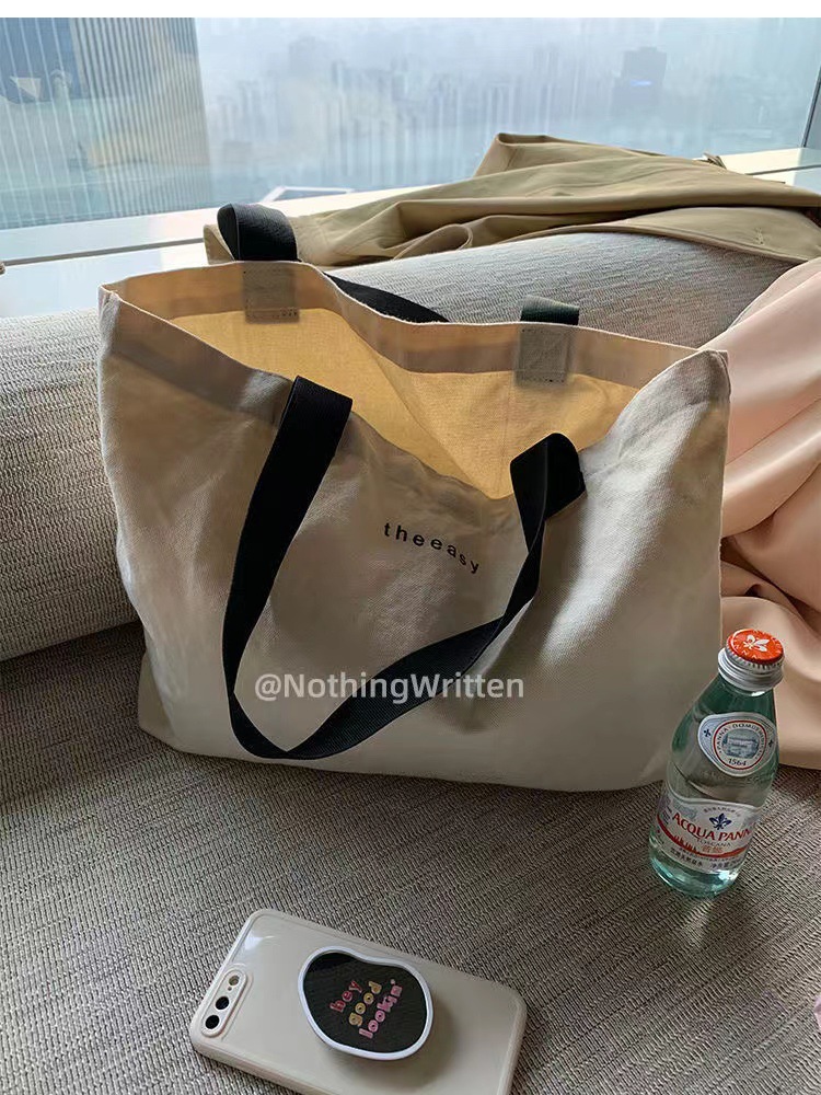 轻奢小众设计法式高颜值简约帆布包单肩包手提包购物袋女学生书包