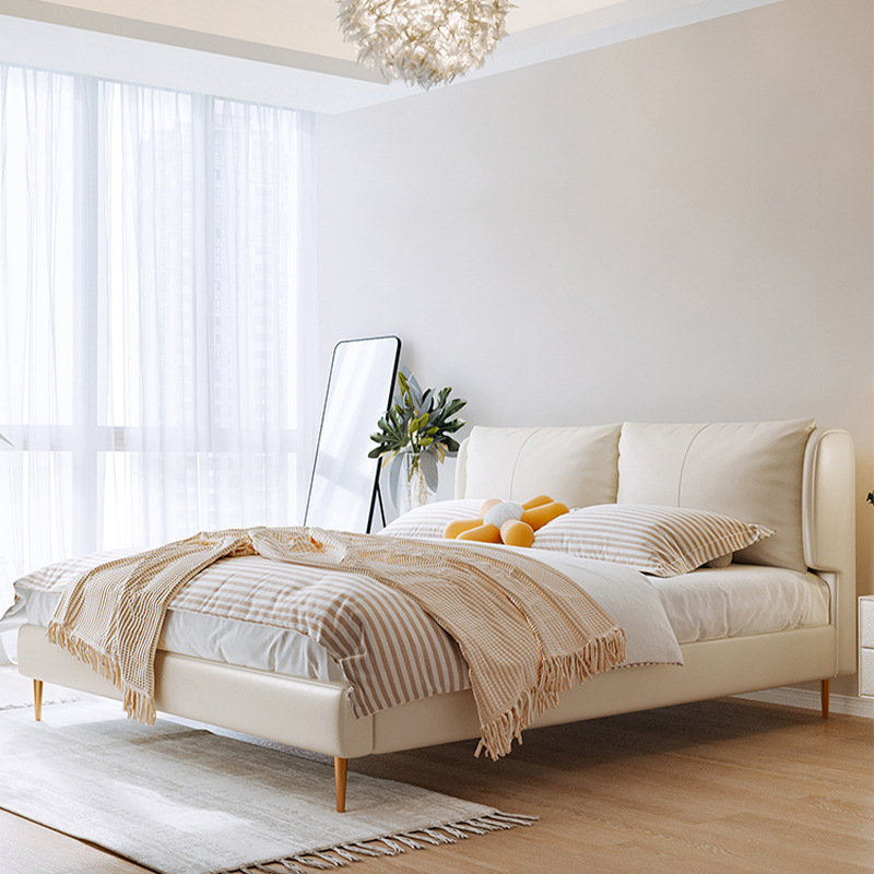 包邮意式轻奢皮床现代简约真皮床北欧双人床主卧羽绒包床高脚