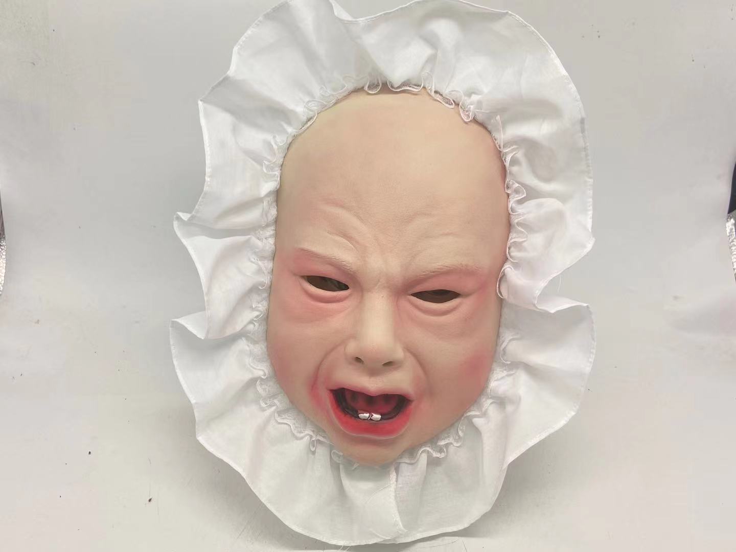 克重:约200克材料:乳胶 面具品名:哭笑娃娃头套工厂直销,可承接各类