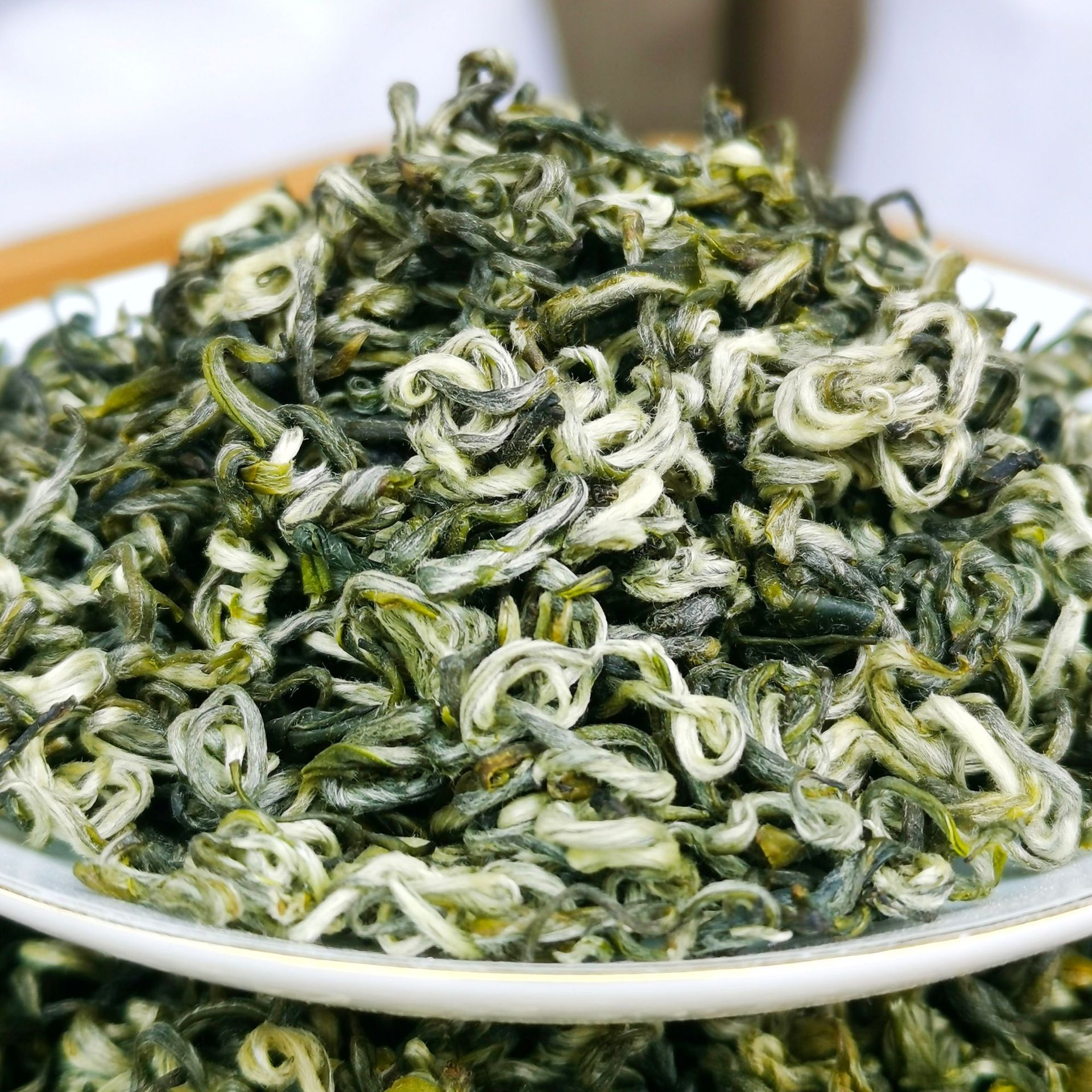 2022年新茶春季碧螺春绿茶半曲手工半卷浓香口感工厂散装批发500g