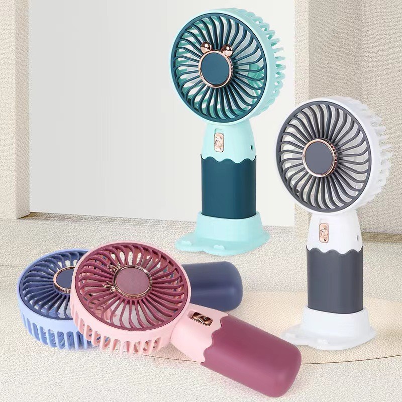 New Product Mini Handheld Fan Portable Usb Charging Mute Office Desk Surface Panel Small Fan Wholesale