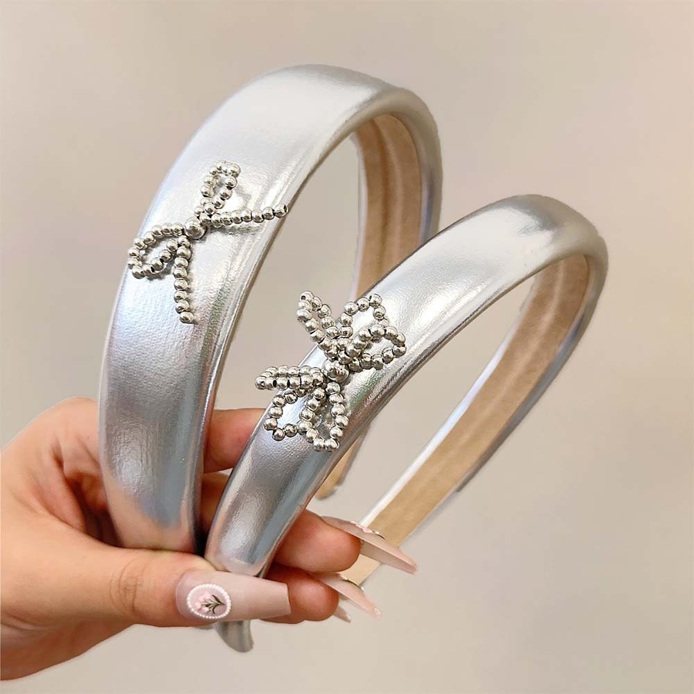 银色蝴蝶结pu皮质发箍女高级感压发发卡高颅顶头箍小众设计发饰新