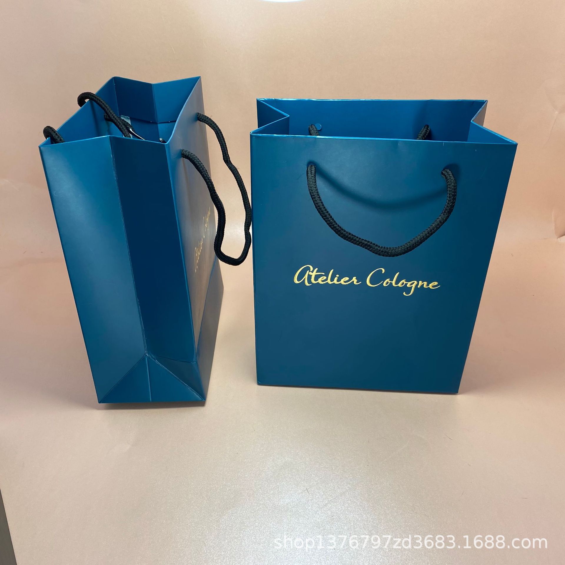 欧美大牌欧珑香水口红手提袋纸袋化妆品香水礼袋购物礼品袋子批发