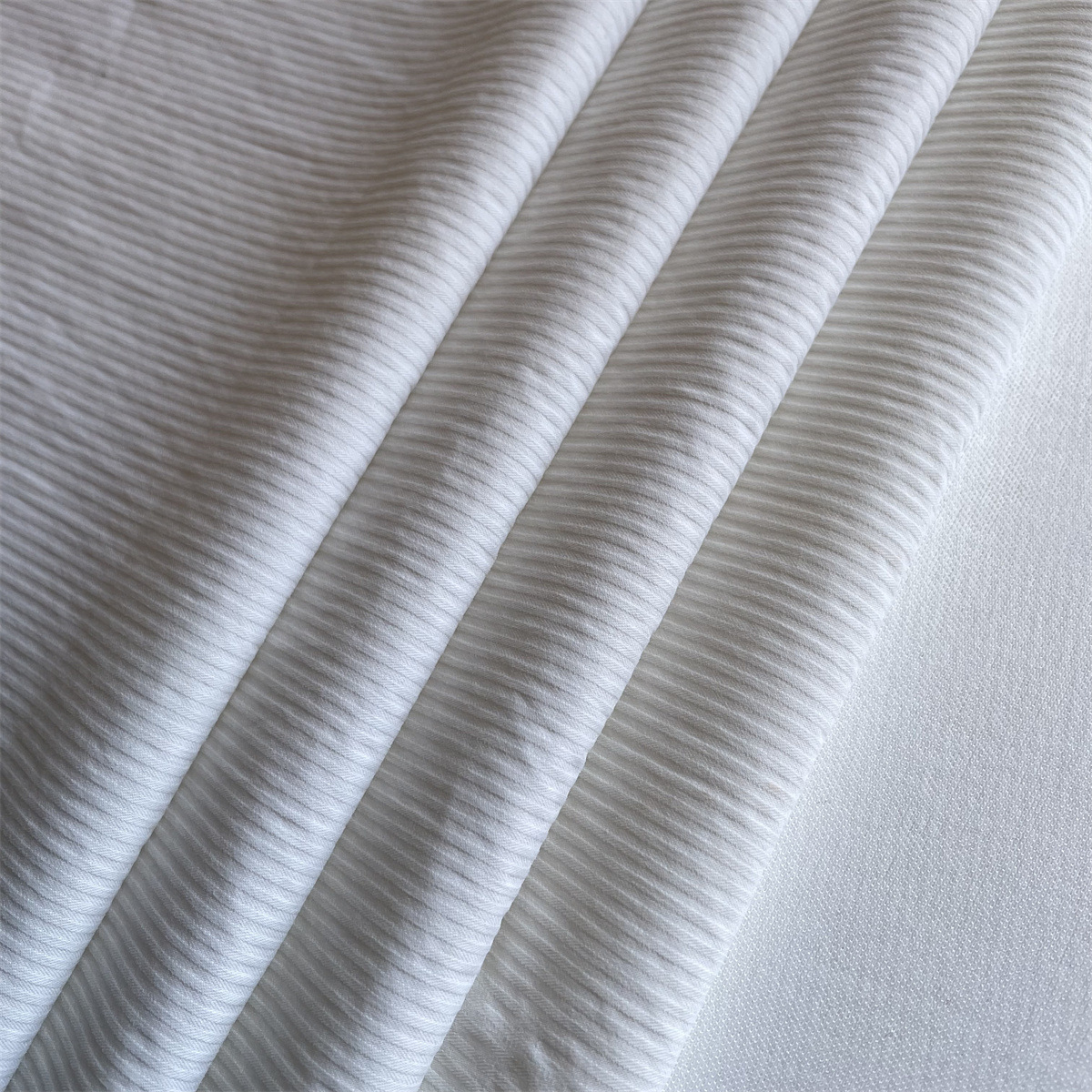 厂家直销锦纶空变弹力布休闲服裤装时装面料量大从优