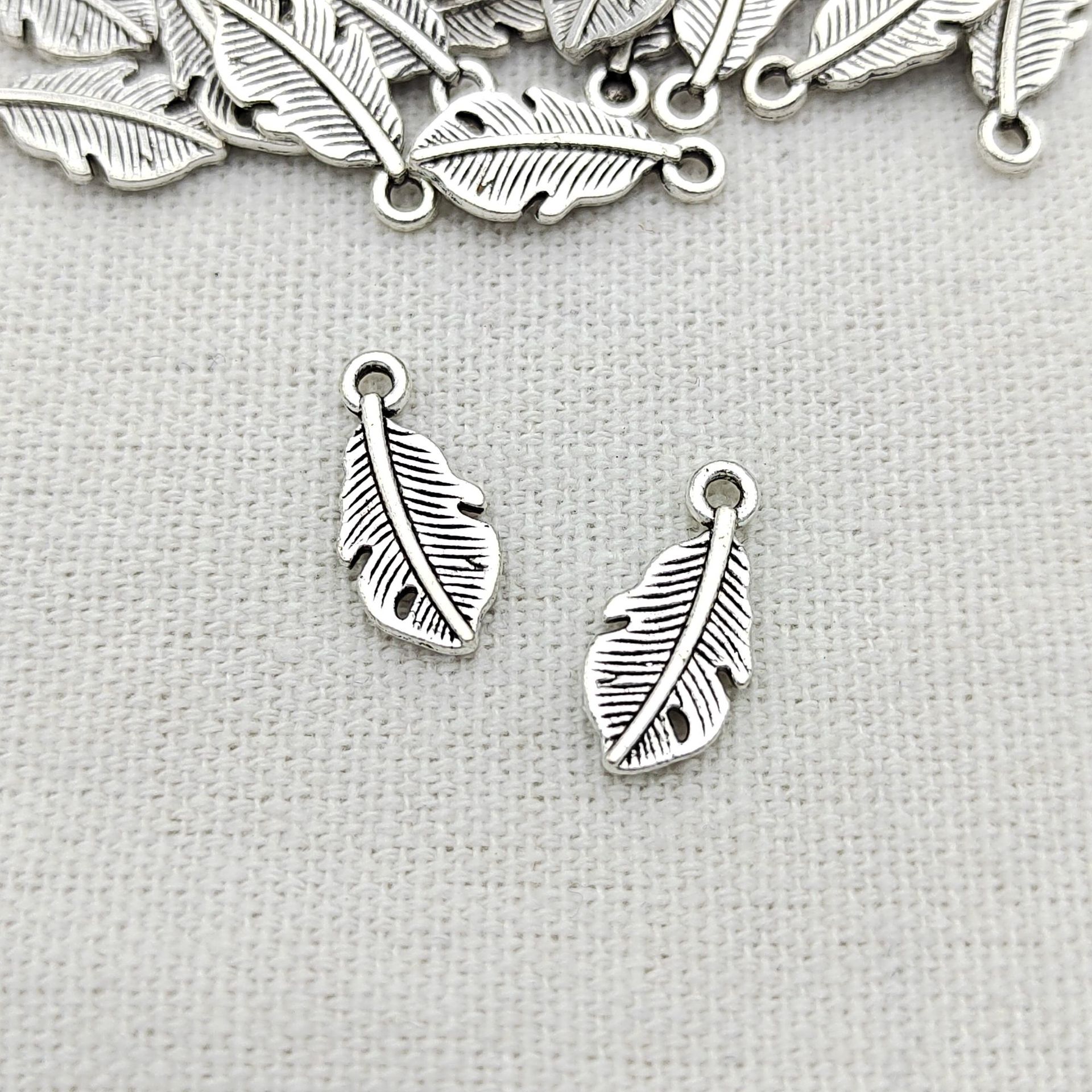 小众配饰diy材料鸟类羽毛吊坠项链金属挂件亚马逊货源1.5*0.