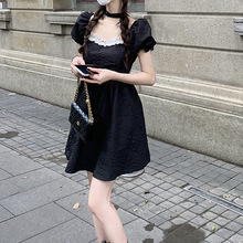 2024夏法式方领露背连衣裙女设计感蝴蝶结泡泡袖裙子黑色显瘦短裙