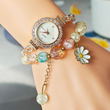 新款时尚镶钻圆形女士手表缠绕花型自由调节手链表女款石英表批发