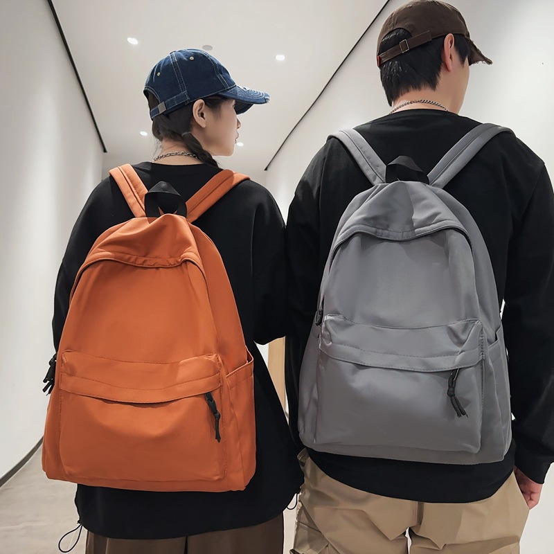 新款学生双肩包女韩版时尚学院风书包休闲大容量情侣背包一件代发