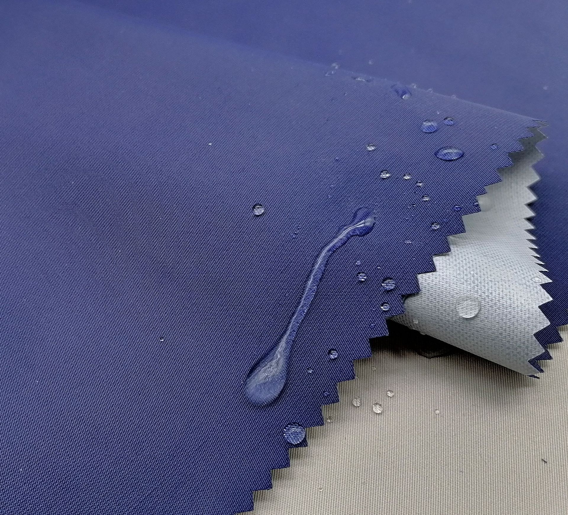 现货批发尼龙塔丝隆斜纹竹节贴膜 抗寒防水透气校服冲锋衣面料