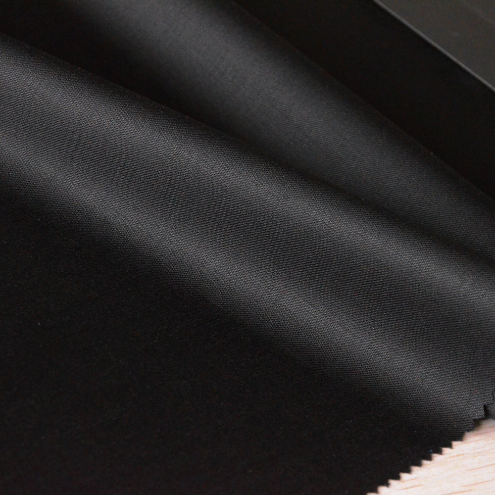 实测100羊毛黑色斜纹哔叽精纺西服面料 270克精纺全毛羊毛呢绒布