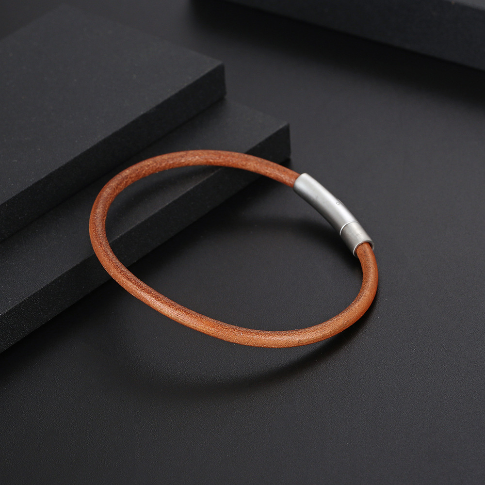 跨境热销钛钢磁扣植鞣革棕色皮手镯朋克复古流行情侣款圆线皮手链