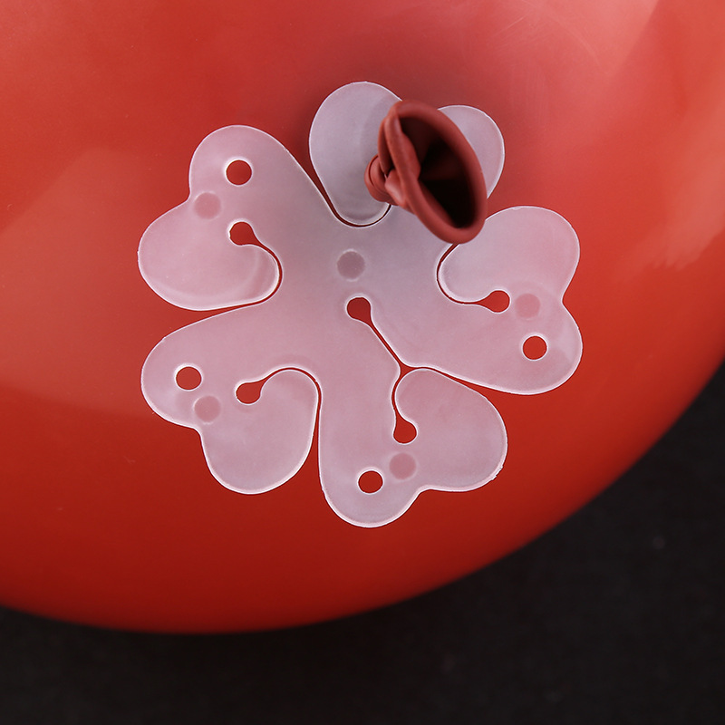 气球梅花扣【包      装】:编织袋散装 一袋5000片【产品用途】:气球