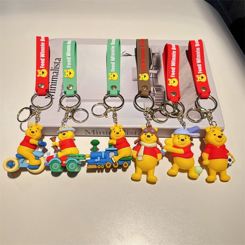 Creative Cartoon Sports Winnie-the-Pooh Keychain Cute Cycling Little Train Bear Key Chain Men's and Women's Handbags Pendant