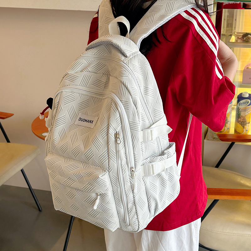 2024夏季新款书包中小学生女大容量纯色小众简约时尚高中生双肩包