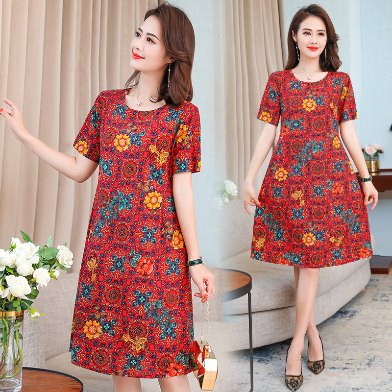 女士中长款花裙子夏天新款风印花连衣裙时尚宽松版妈妈a字裙