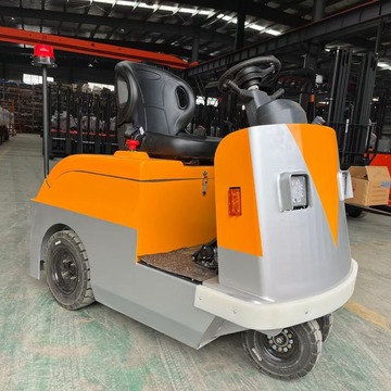 座驾式电动牵引车10吨航空搬运拖车移动蓄电池牵引头转运托盘挂车