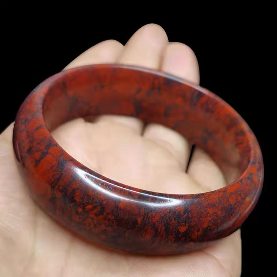 天然新疆红伊丁陨石手镯鸡血石玉手镯抗疲劳养生工厂直销量大从优