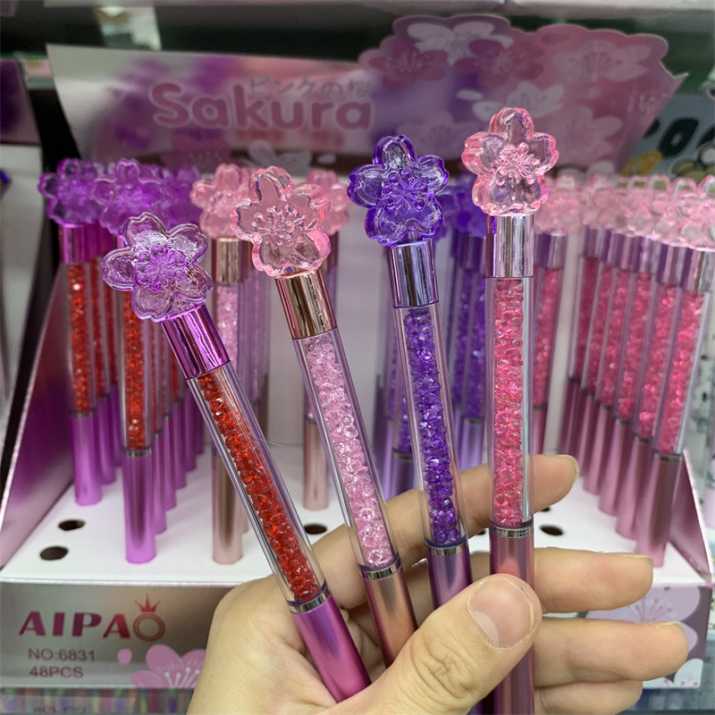 外贸跨境粉色唯美樱花造型钻石旋转圆珠笔樱花瓣写字笔学生礼品笔
