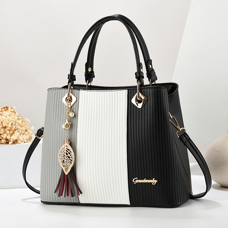 韩版高级感拼色女包2024新款女士质感大容量流苏手提包洋气妈妈包