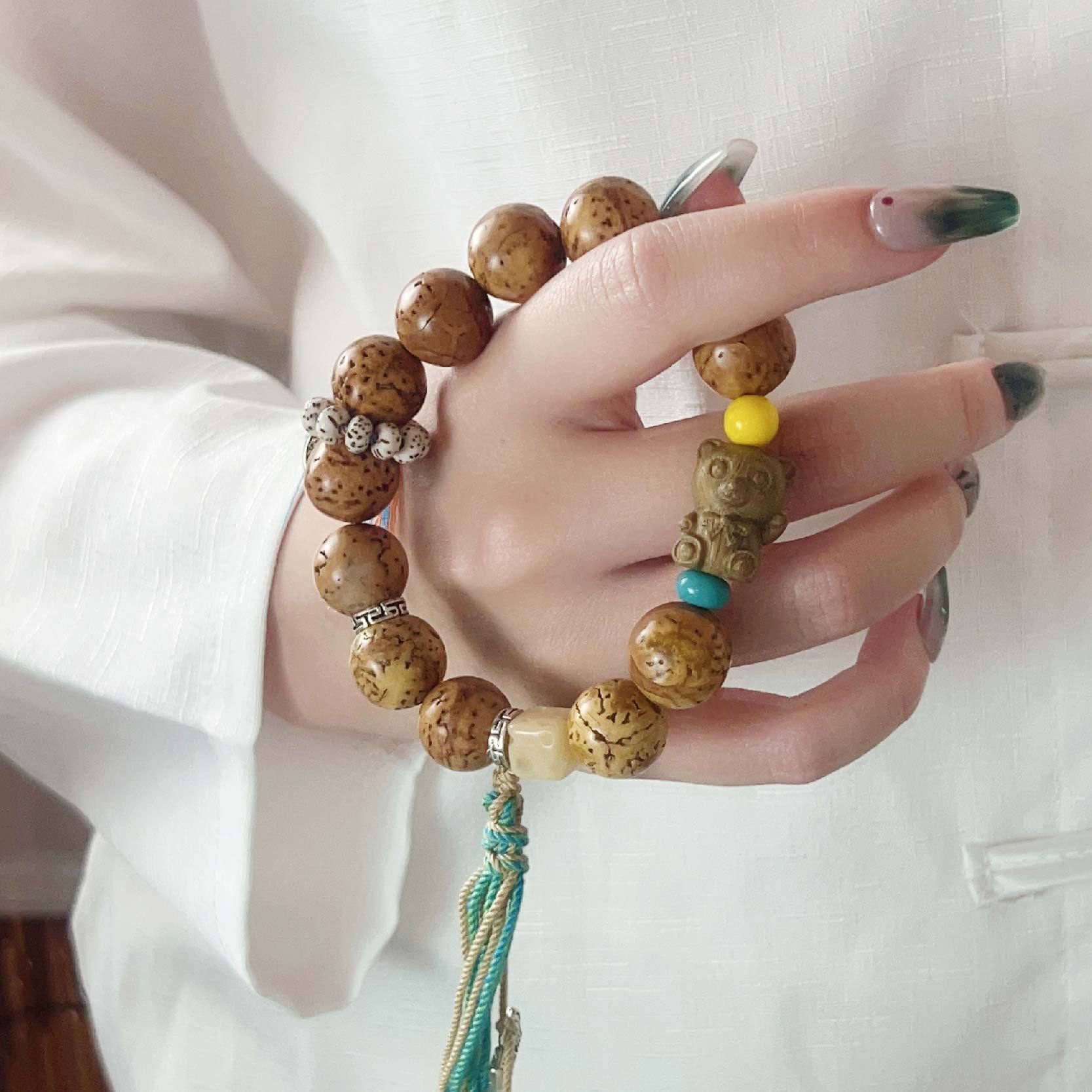 直播景区景点地摊供货龙眼菩提根小熊流苏佛珠项链男女菩提手串