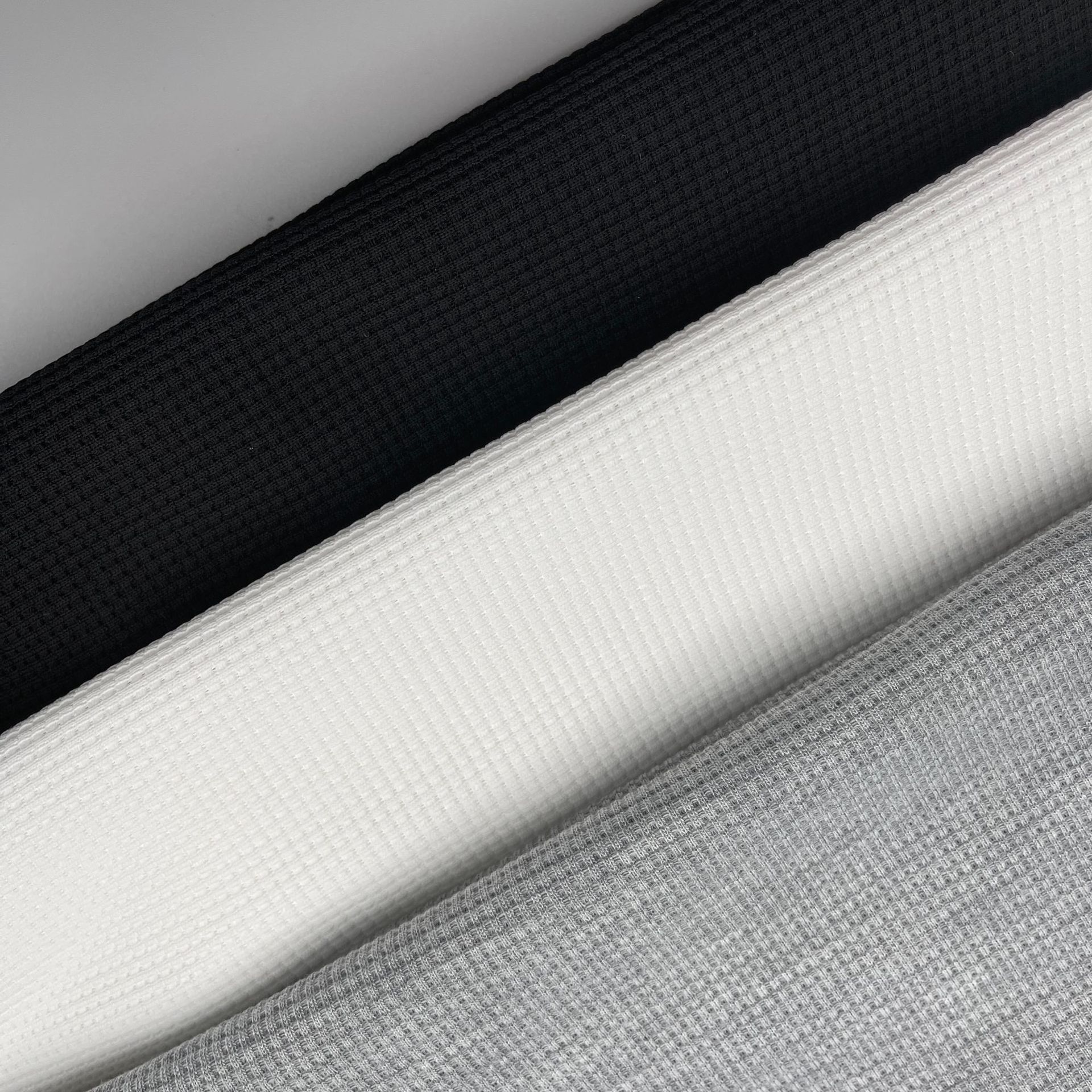 现货供应 华夫格棉感 250g卫衣面料小方块菠萝格运动休闲质量佳