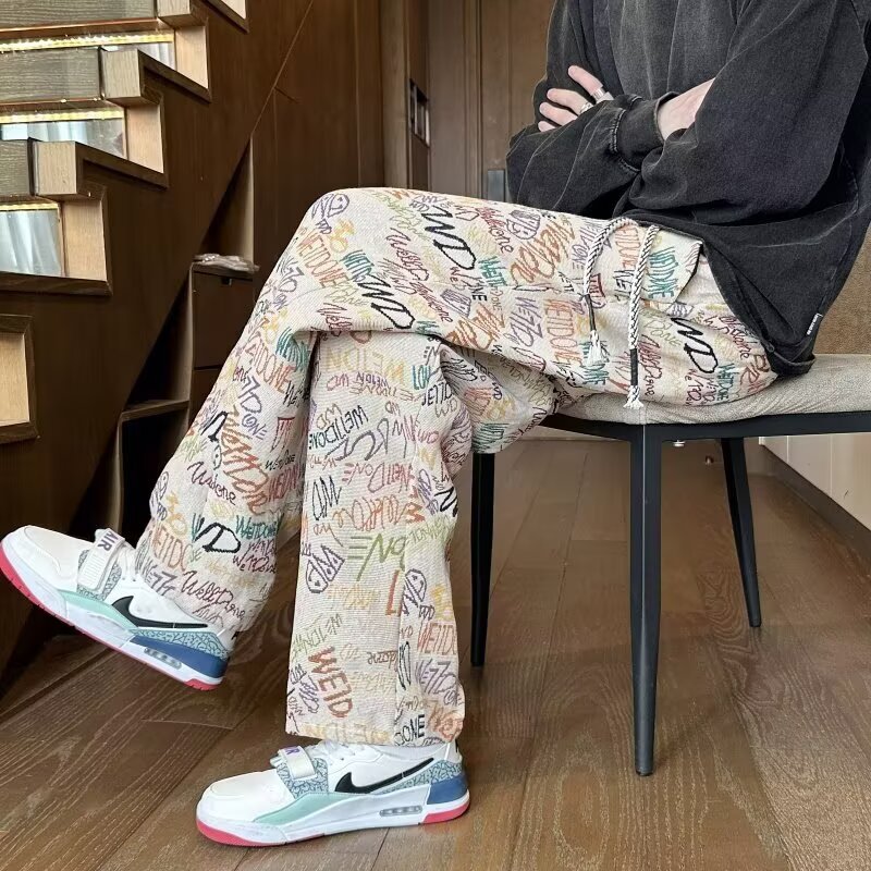 美式涂鸦字母提花休闲裤男潮牌痞帅高街嘻哈宽松直筒长裤秋季卫裤