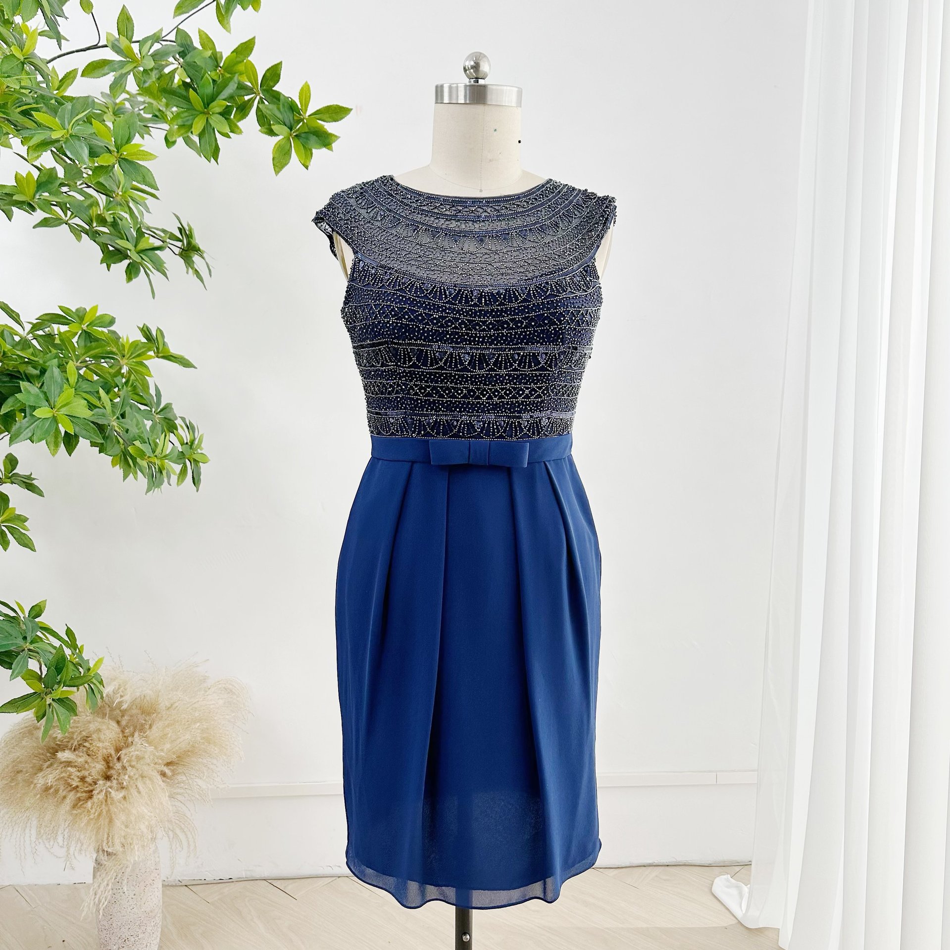 深蓝色气质简约无袖收腰修身a字型日常聚会中长款礼服裙m2812
