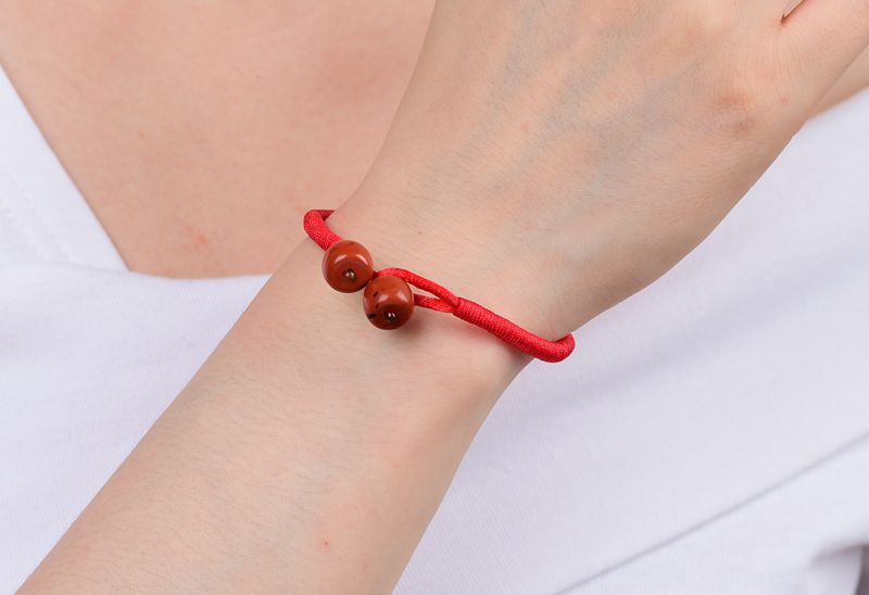 点爵珠宝 厂供5a红竹石手编红绳手链 女款红石水晶首饰手串批发