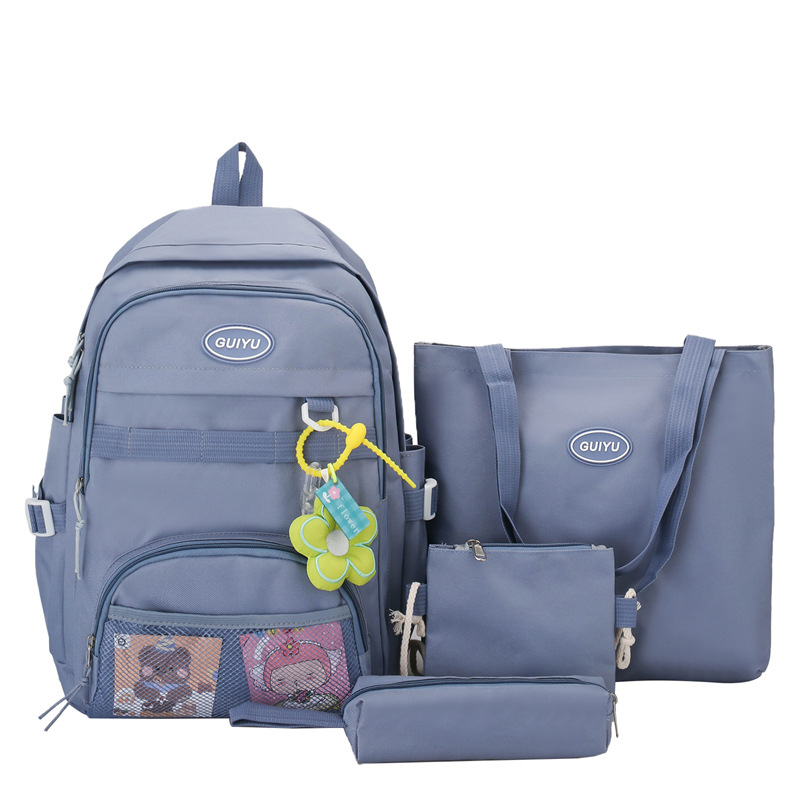Factory Wholesale Fashion Backpack Qiyu Primary School Student Schoolbag Four-Piece Fashion Simple Leisure Bag