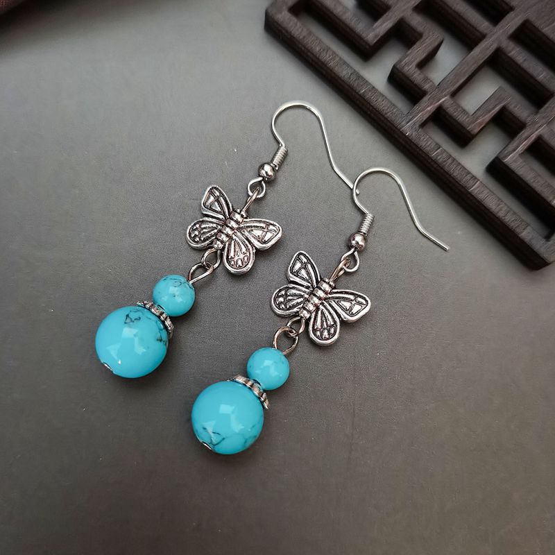 蝶戏粉颊边民族风耳坠女云南首饰耳环女长款饰品蝴蝶气质耳饰r242