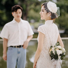 白色新中式旗袍2024新款立领气质蕾丝旅拍订婚轻纱新娘婚礼敬酒服