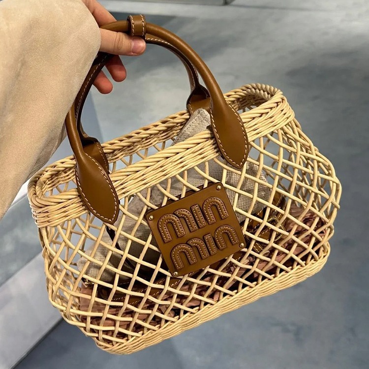 2024春夏新款休闲百搭镂空菜篮子包藤编包休闲度假海边风编织女包