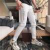 summer Thin section man badge Embroidery Jeans Korean Edition letter Hot stamping Elastic force Self cultivation Feet white trousers summer Thin section man badge Embroidery Jeans Korean Edition letter Hot stamping Elastic force Self cultivation Feet white trousers