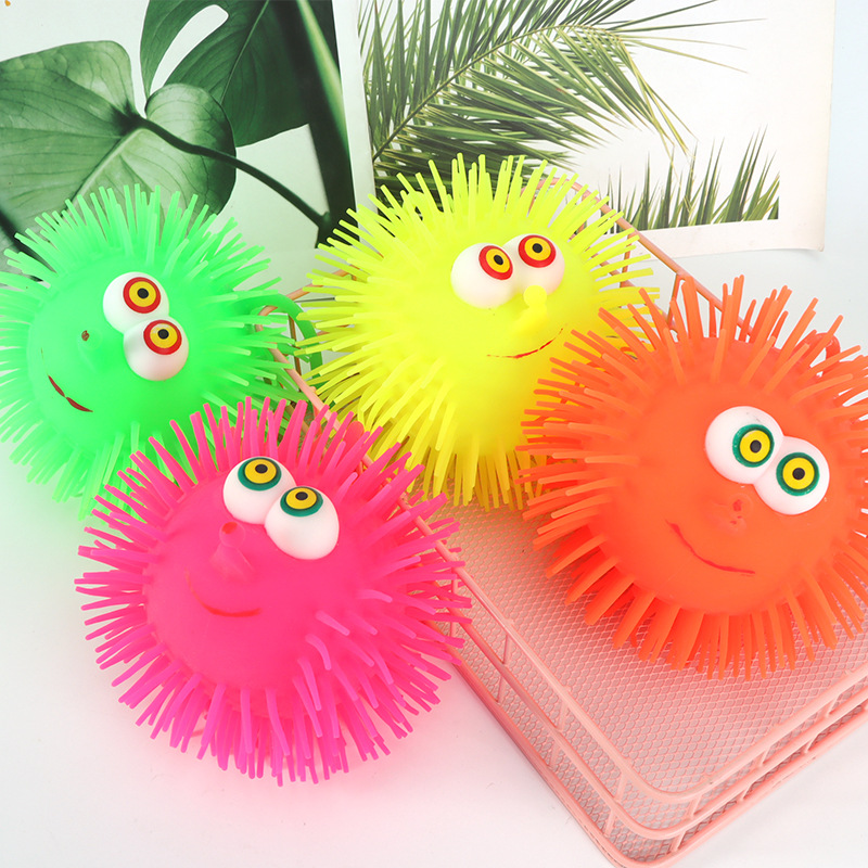 发光毛毛球带绳刺球大号捏捏球凸眼闪光文具球七彩发光文具小玩具