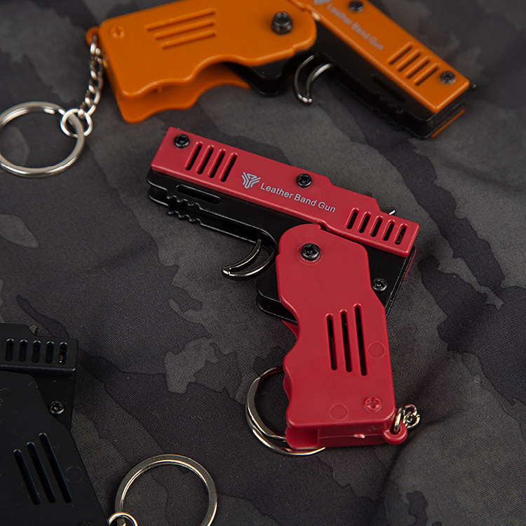 Folding All-Metal Mini Folding Keychain Rubber Band Gun Children's Gift Six Continuous Hair Rubber Band Cap Gun