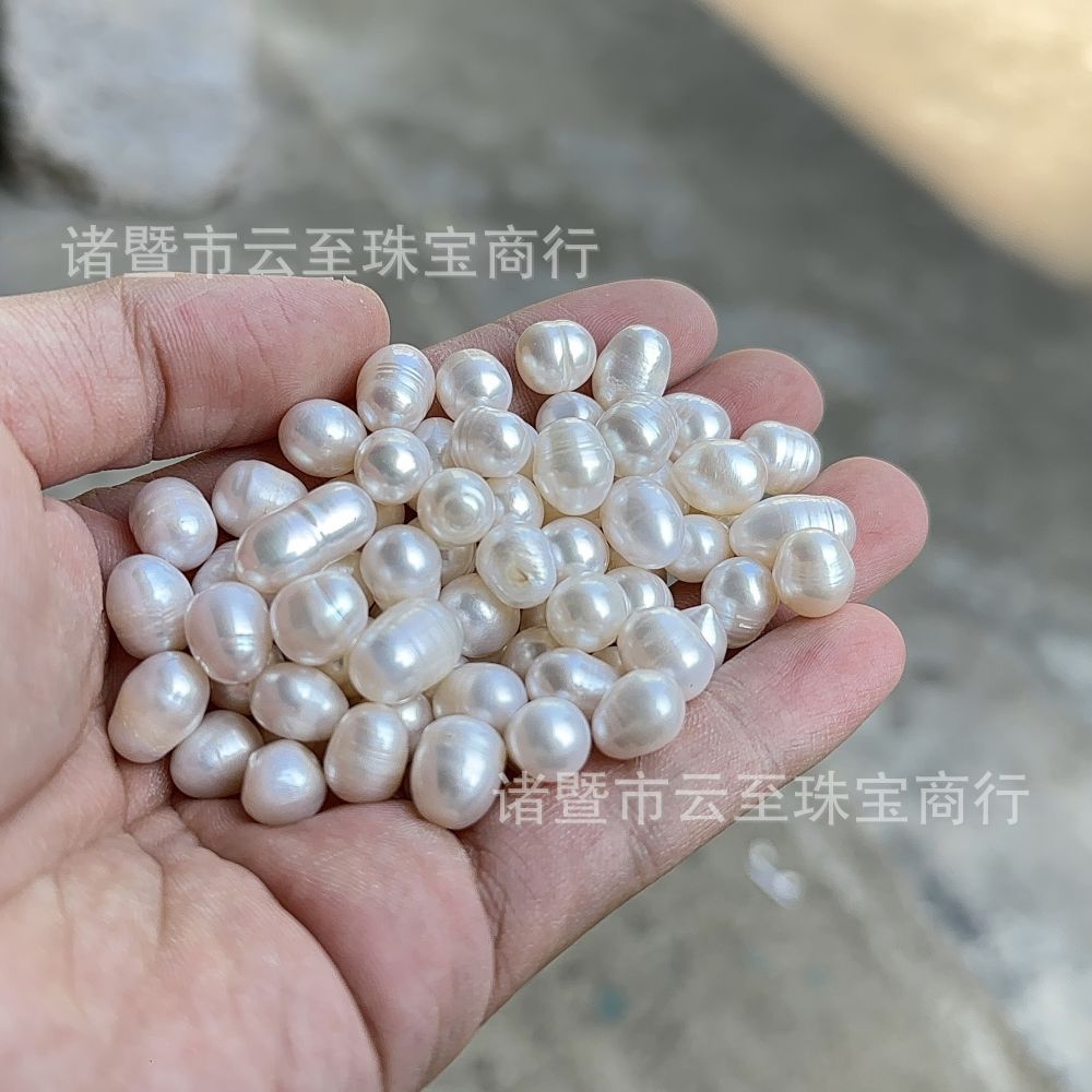 药用珍珠批发 称重卖 淡水珍珠无核螺纹冲头米形花盆装饰白亮