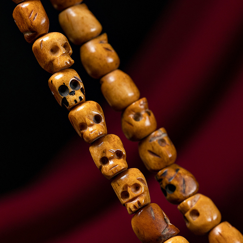 天然西藏牦牛骨手工雕刻骷髅头珠子老牛骨108颗佛珠手串手链配饰