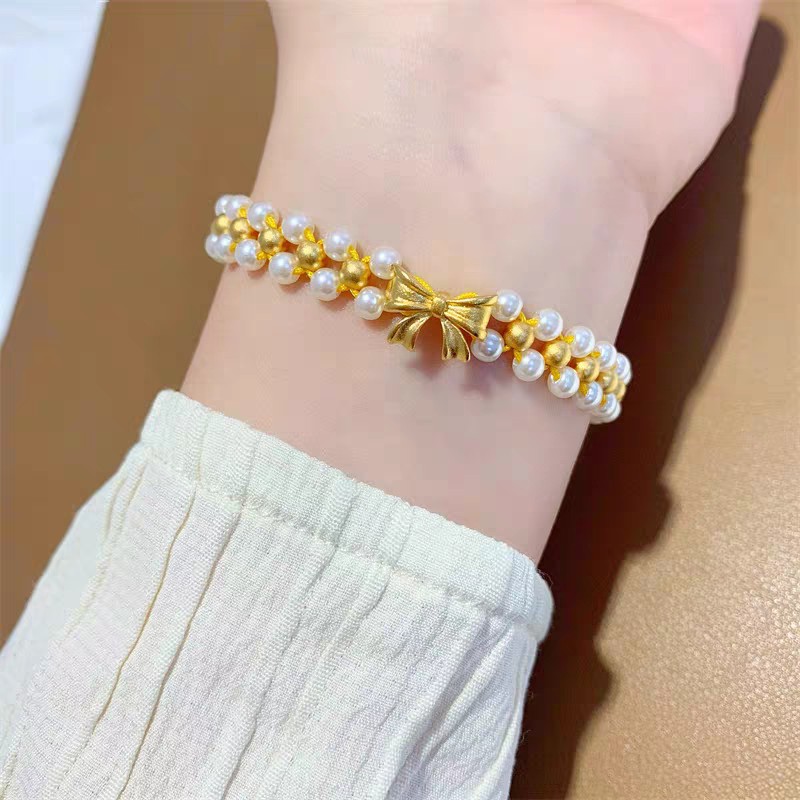抖音爆款在逃公主蝴蝶结手链女ins小众设计新款珍珠手串编织手绳