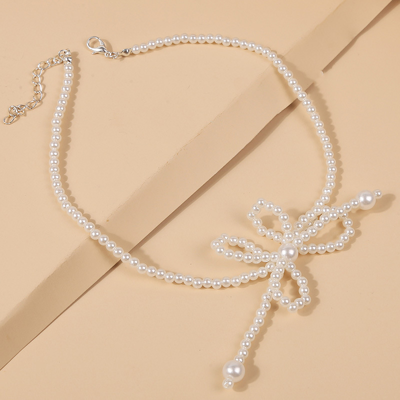 韩式简约可爱手工编织珍珠蝴蝶结项链 欧美个性串珠颈链饰品