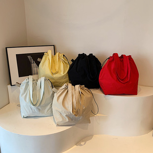 Fashionable Simple Bucket Bag Women's 2024 Summer New Textured Nylon Cloth Shoulder Bag Commuter Casual Underarm Bag