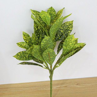 Artificial plant color changing Wood sprinkling Banyan leaf White Sea paulownia leaf green radish artificial plant wall accessories green plant handle bundle