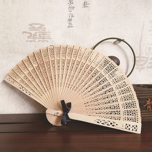 Cross-border hot-selling in stock full punch wooden fan carved wooden Fan Yang flower wooden fan with ribbon wedding fan