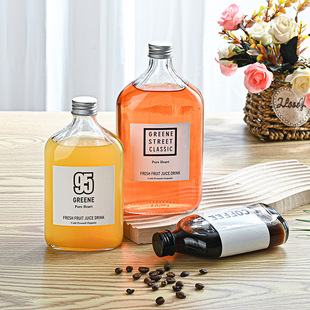 Wholesale new glass beverage juice bottle oblique shoulder glass bottle beverage milk tea bottle wine bottle coffee bottle