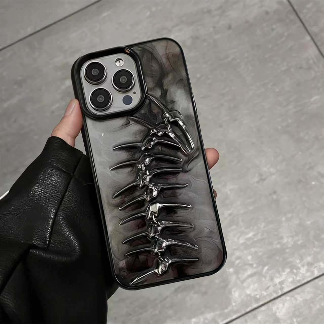 Trendy and cool metallic fishbone case for Apple iPhone 17, iPhone 16 Pro Max, high-end gothic style.